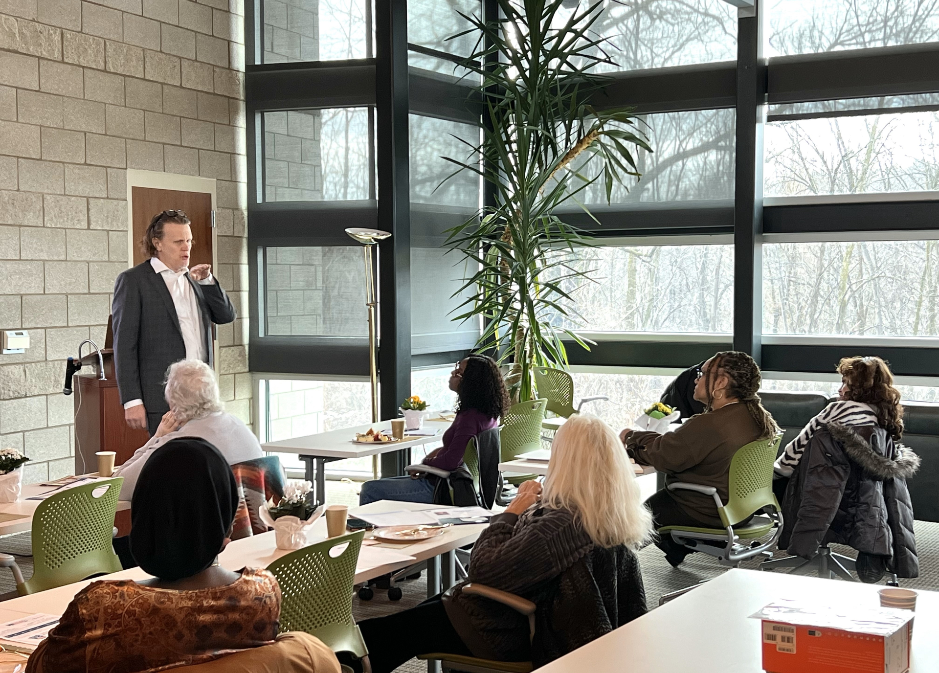 George W. Johnson III speaking at a V8 Wealth Management educational event